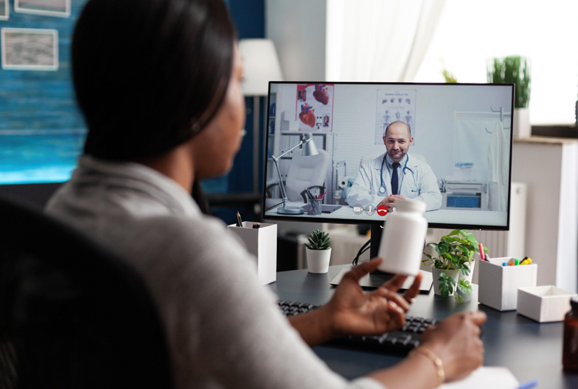 african american patient talking with online therapist
