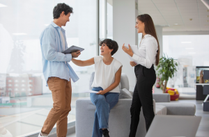 coworkers talking at office
